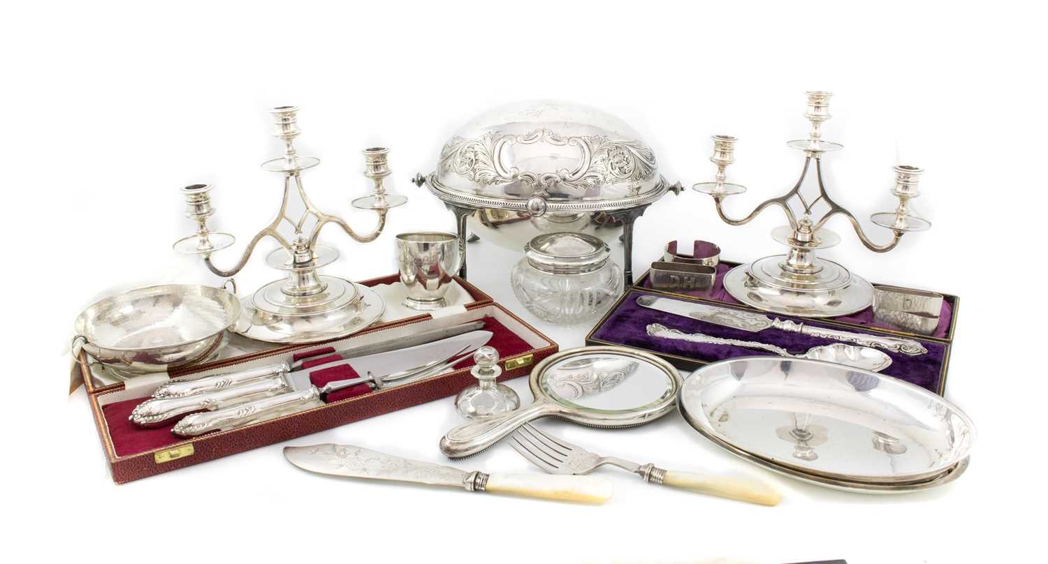 A mixed lot, comprising: a silver christening cup, a two-handled bowl, four napkin rings, a silver-