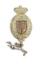 A George III silver-gilt King's messenger badge, unmarked, the greyhound with a lion passant, shaped