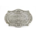 An Edwardian Art Nouveau silver dressing table tray, by William Hutton & Sons Ltd, London 1901,