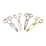 A collection of four pairs of Victorian naturalistic silver sugar nips, including: a silver-gilt