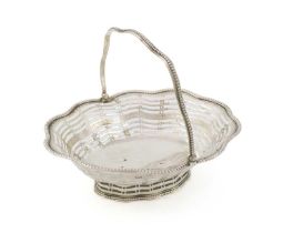 A George III silver swing-handled sweetmeat basket, by Thomas Daniell, London 1778, shaped oval