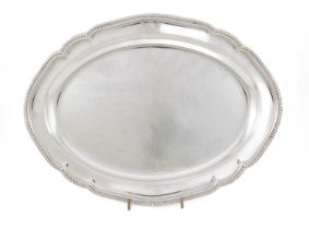 A George III silver meat platter, by Robert Garrard, London 1805, oval form, gadroon border,