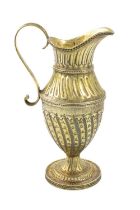 A George III silver-gilt cream jug, maker's mark worn, London 1808, baluster vase form, fluted and