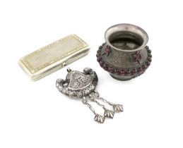 A small mixed lot of silver items, comprising: a vase of circular bellied form, set with red stones,