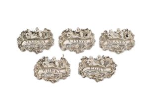 A set of five wine labels, unmarked, shaped oblong form, with foliate decoration and a cherub