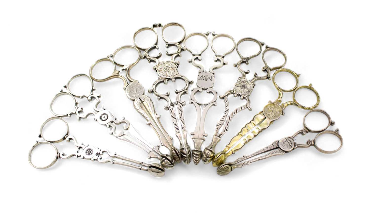 A collection of eight pairs of mid-18th century silver sugar nips, various dates and makers, circa
