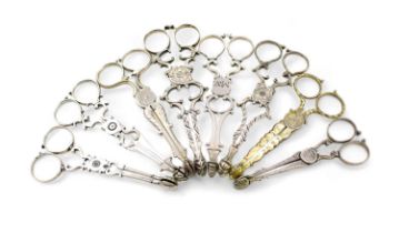 A collection of eight pairs of mid-18th century silver sugar nips, various dates and makers, circa