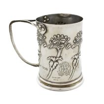 An Edwardian Art Nouveau silver mug, by William Hutton and Sons, London 1901, cylindrical form,