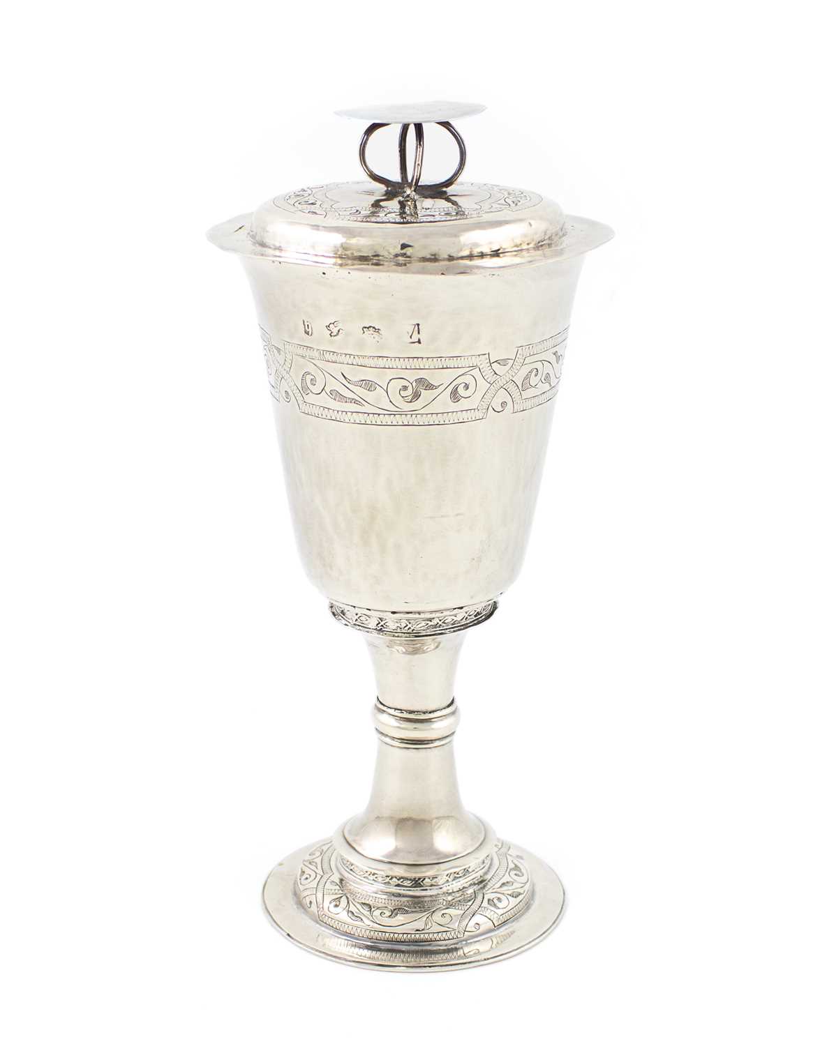 An Elizabeth I silver chalice and cover, London 1565, maker's mark of a device, tapering circular