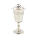 An Elizabeth I silver chalice and cover, London 1565, maker's mark of a device, tapering circular