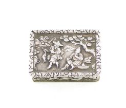 A 19th century Chinese silver vinaigrette, unmarked, rectangular form with foliate borders, the