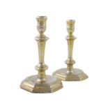 A pair of Queen Anne silver-gilt candlesticks, by Simon Pantin, London 1713, tapering octagonal