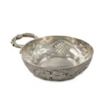 A late-18th century French silver wine taster, maker's mark possibly MP, circular form, vine and