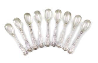 A matched set of nine Victorian Irish silver King's pattern egg spoons, five by John Smyth, Dublin