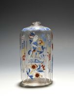 A German enamelled glass flask, 18th century, painted with a white rabbit or hare smoking a long-