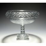 An Irish cut glass bowl or centrepiece, 19th century, the circular bowl with an everted rim cut with