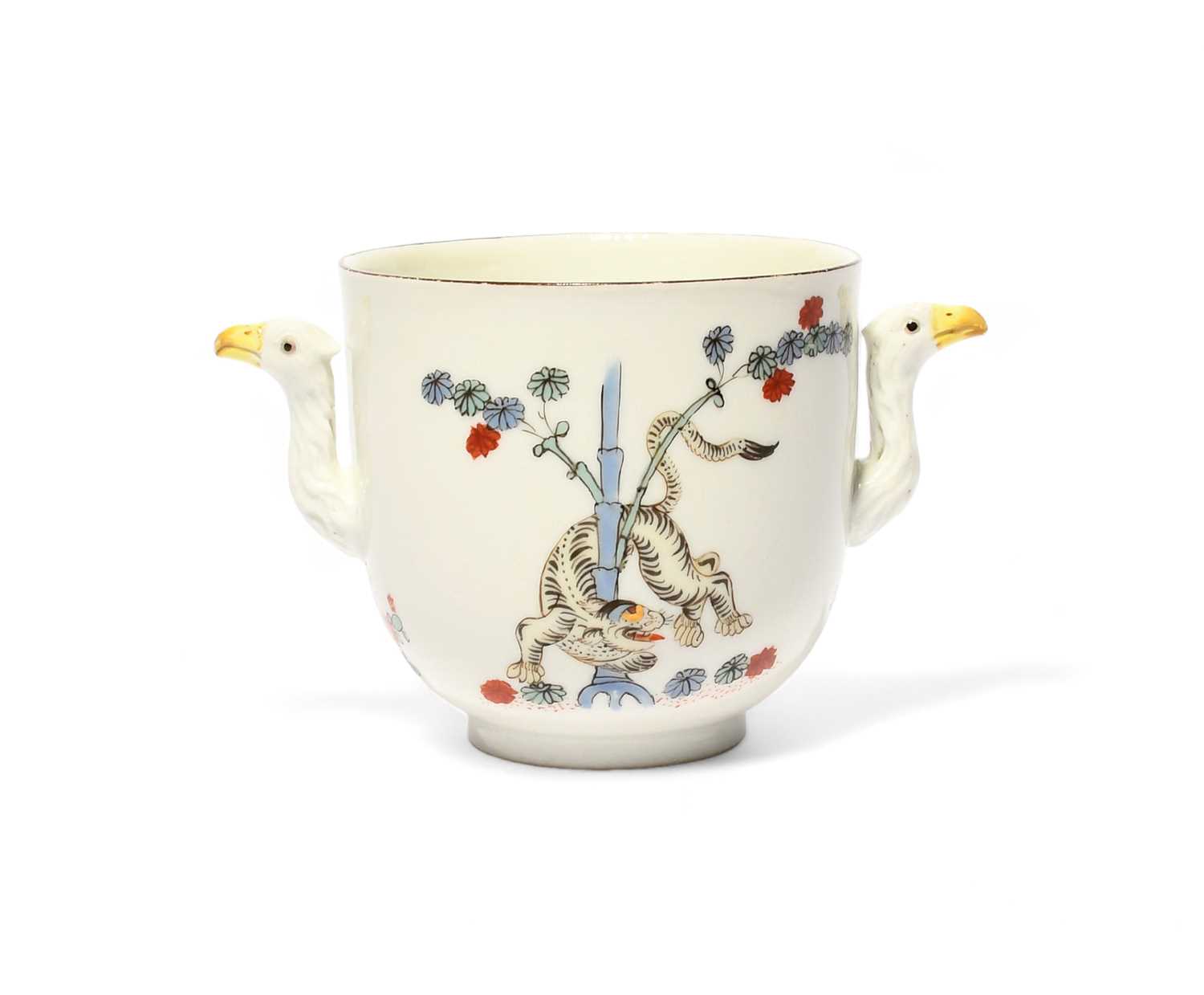 A Meissen two-handled cup, c.1730, painted in Kakiemon enamels with the Gelbe Löwe pattern, a