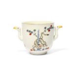A Meissen two-handled cup, c.1730, painted in Kakiemon enamels with the Gelbe Löwe pattern, a