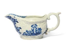 A small Vauxhall blue and white creamboat or small sauceboat, c.1757-60, moulded with flowers and