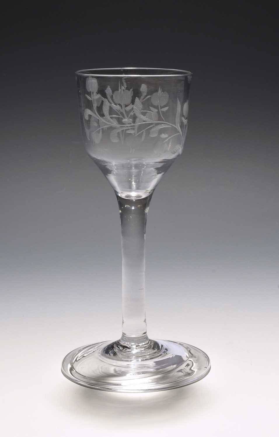 A small cider glass, c.1750, the ogee bowl engraved with a fruiting apple branch, the reverse with a
