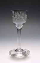 A small cider glass, c.1750, the ogee bowl engraved with a fruiting apple branch, the reverse with a