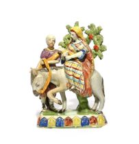 A Staffordshire figure group of the Flight to Egypt, early 19th century, modelled with Mary and