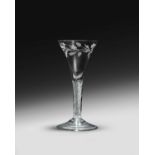A wine glass or goblet of Jacobite significance, c.1760, the generous drawn trumpet bowl finely