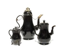 Two Jackfield coffee pots and covers, c.1750, the larger coffee pot with later silver-coloured metal