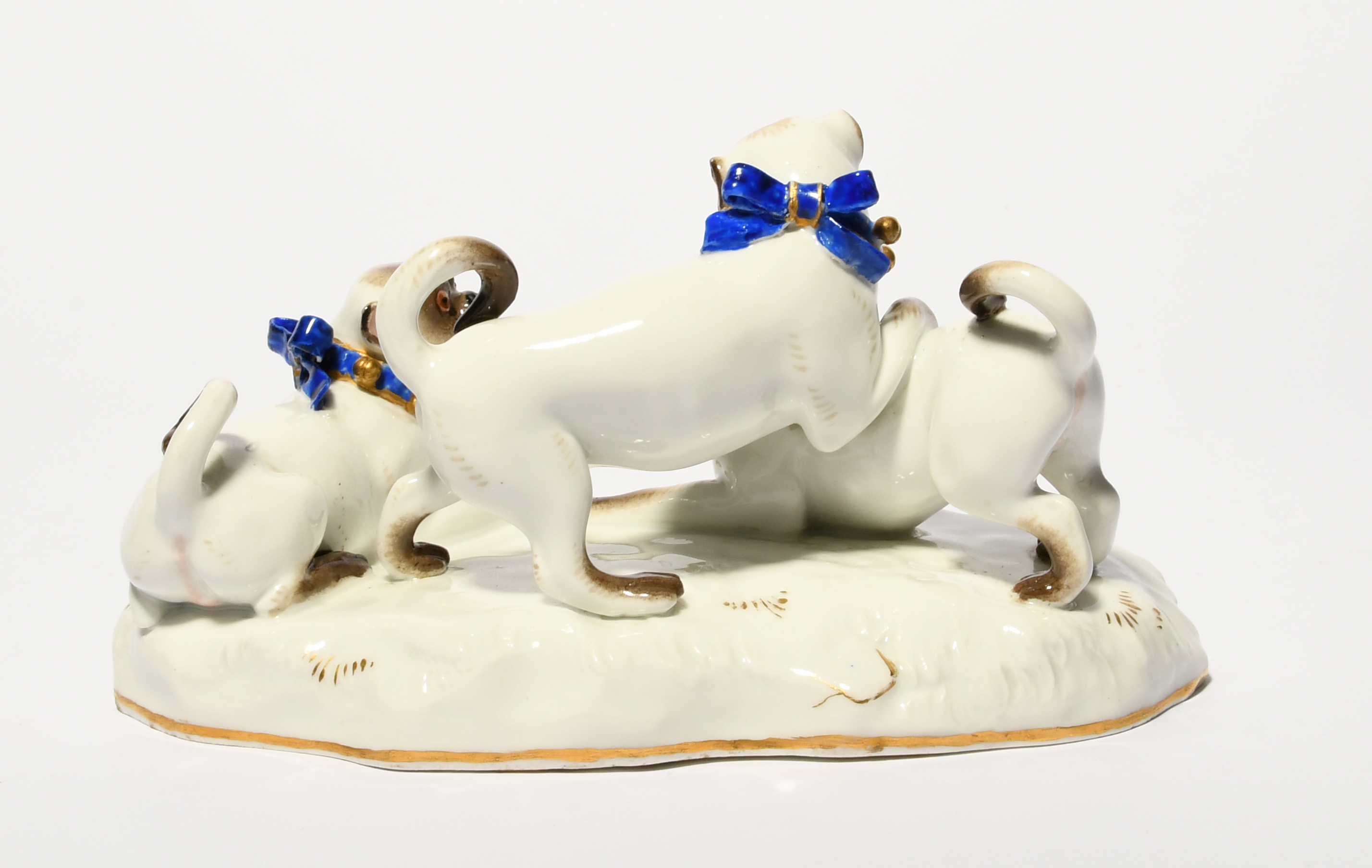 A Meissen group of pugs at play, 19th century, the three dogs wearing blue ribbon collars with - Image 3 of 3
