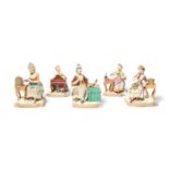 A set of Meissen figures of the Five Senses, late 19th/20th century, modelled by J C Schönheit, each