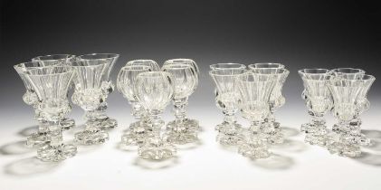 A large suite of glass, 19th century, with octagonal cut bowls raised on knopped faceted stems