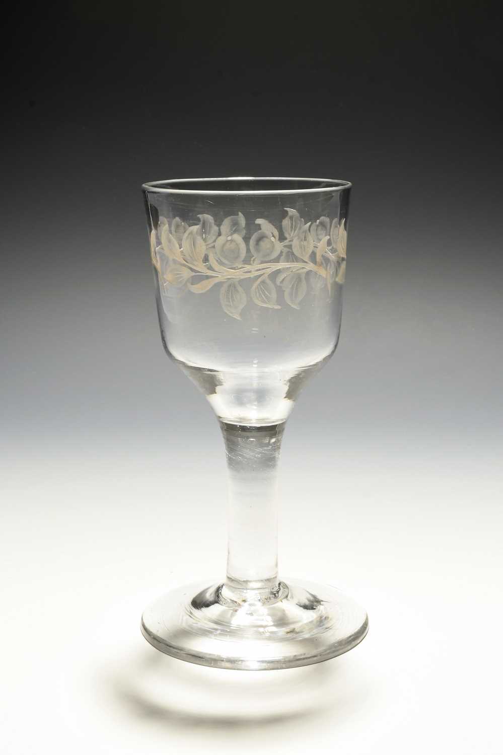 A good and large cider glass, c.1755-60, the deep ogee bowl engraved with two fruiting branches of - Image 2 of 2