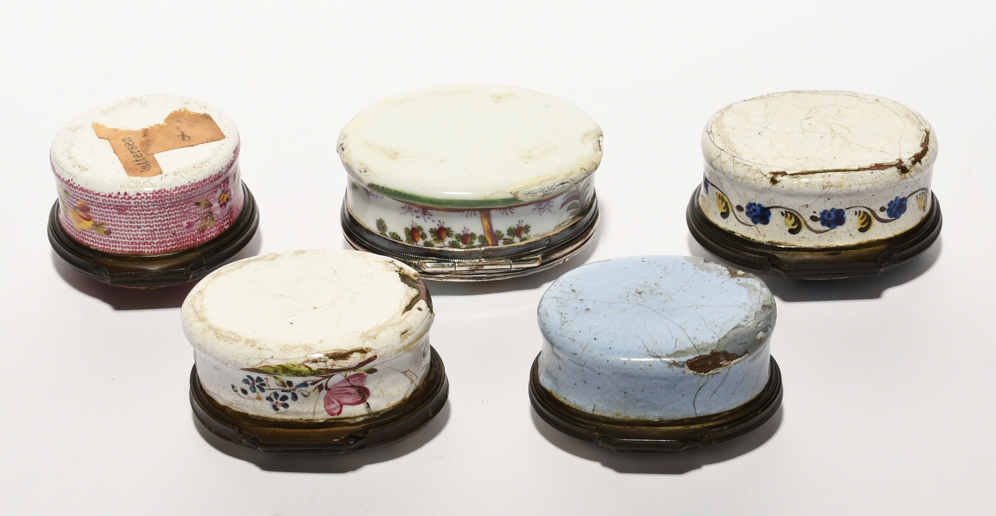 Five enamel patch boxes, 2nd half 18th century, one circular and painted with a rose spray on a dark - Image 2 of 3