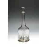 A small cruciform glass serving bottle or decanter, c.1740, of slight cruciform shape, the body