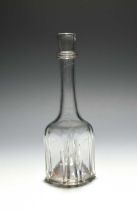 A small cruciform glass serving bottle or decanter, c.1740, of slight cruciform shape, the body