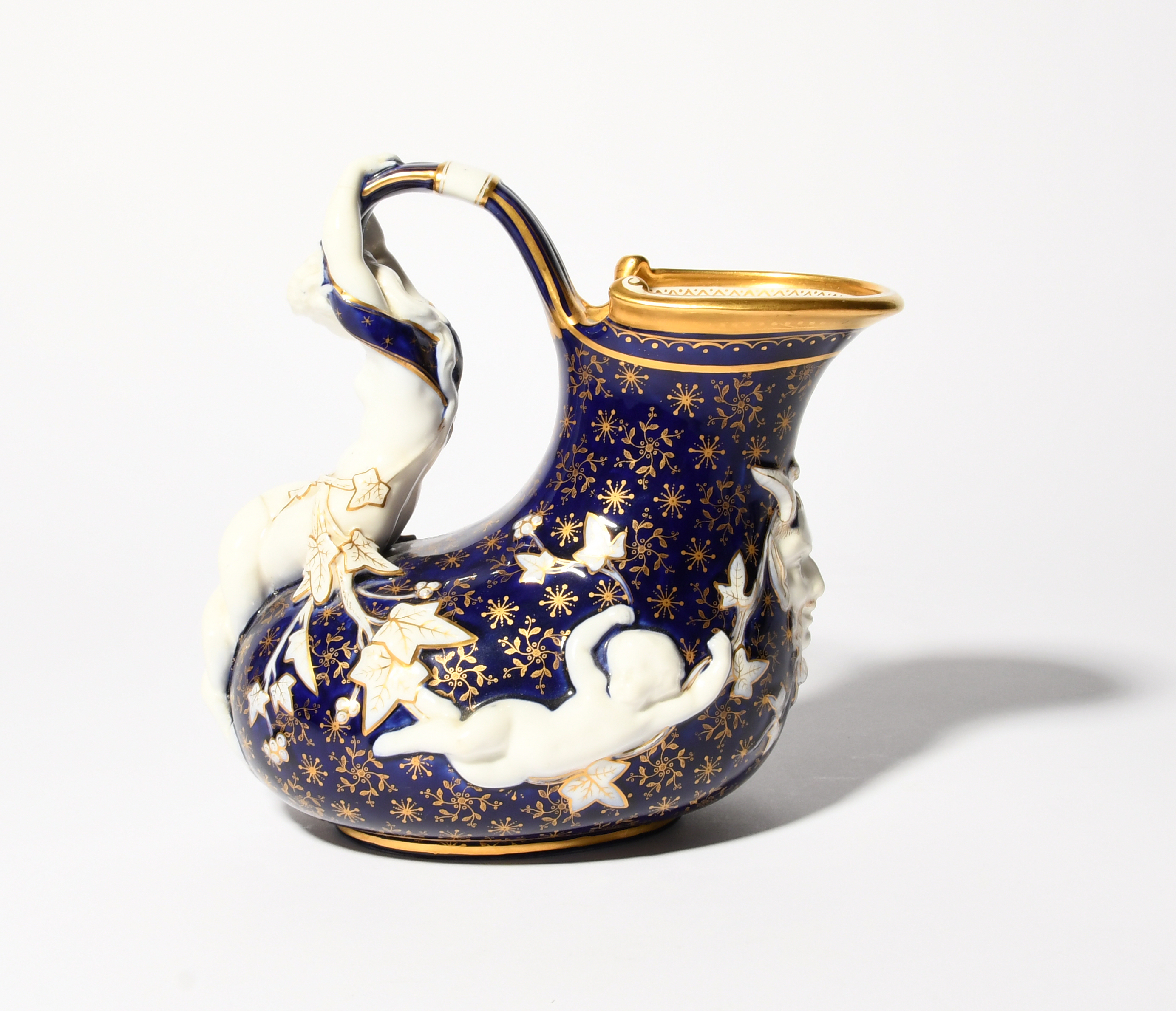 A rare Minton porcelain 'Mermaid' ewer, c.1880, of askos shape, moulded with putti and a horned - Image 5 of 5