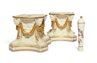 A pair of Derby pedestal figure or vase stands, c.1770, of chamfered square form, moulded with