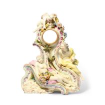 A rare Tournai Chelsea-decorated clock case, c.1760-65, modelled with Cupid above a sleeping maiden,