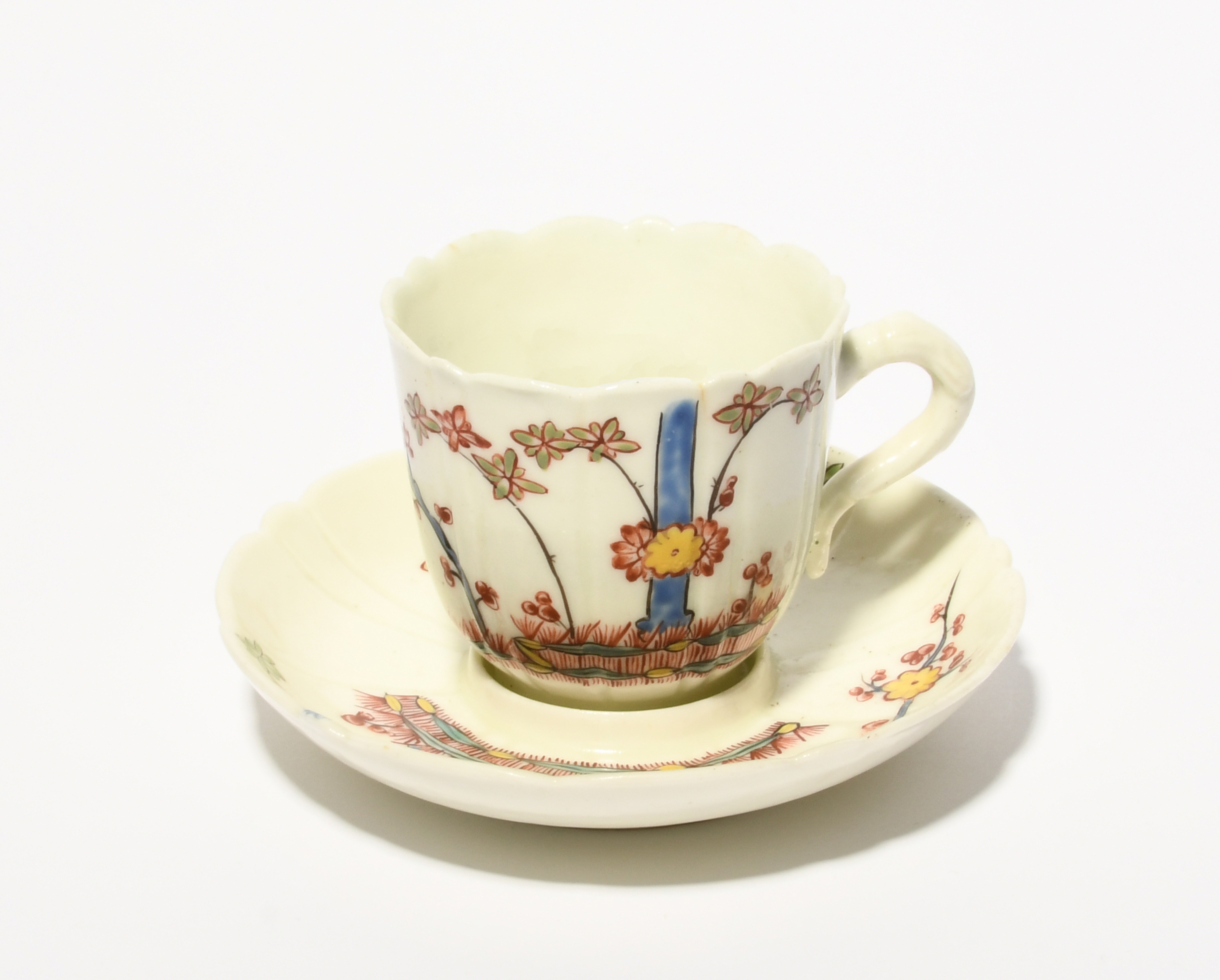 A St Cloud coffee cup and trembleuse saucer, c.1730, the lobed form painted in the Kakiemon manner - Image 4 of 4