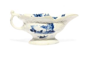 A Worcester blue and white sauceboat, c.1755, painted with the Sinking Boat Fisherman pattern,