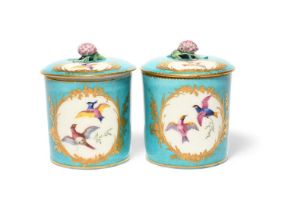 A pair of Sèvres toilet pots (pots à pomade) and covers, c.1760, later decorated with panels of