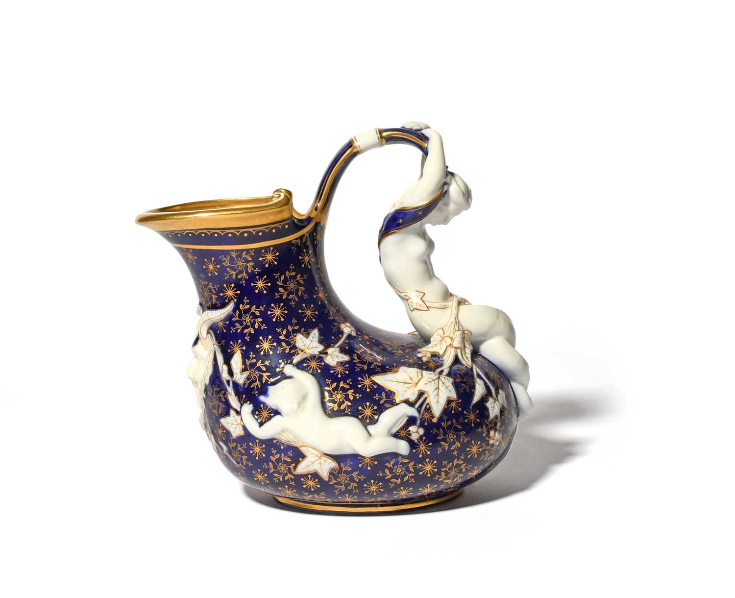 A rare Minton porcelain 'Mermaid' ewer, c.1880, of askos shape, moulded with putti and a horned