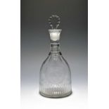 An armorial glass decanter and stopper, late 18th century, of mallet shape, engraved with an