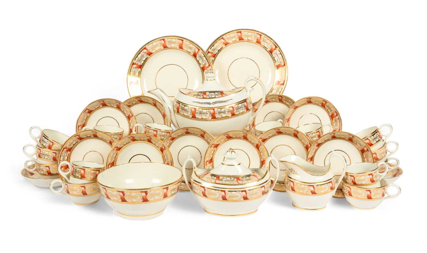 A Grainger's Worcester tea service, c.1810, decorated with bands of oak leaves wrapped in orange