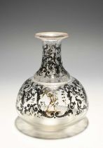 A small Bohemian glass decanter, early 19th century, with schwarzlot decoration of a seated figure