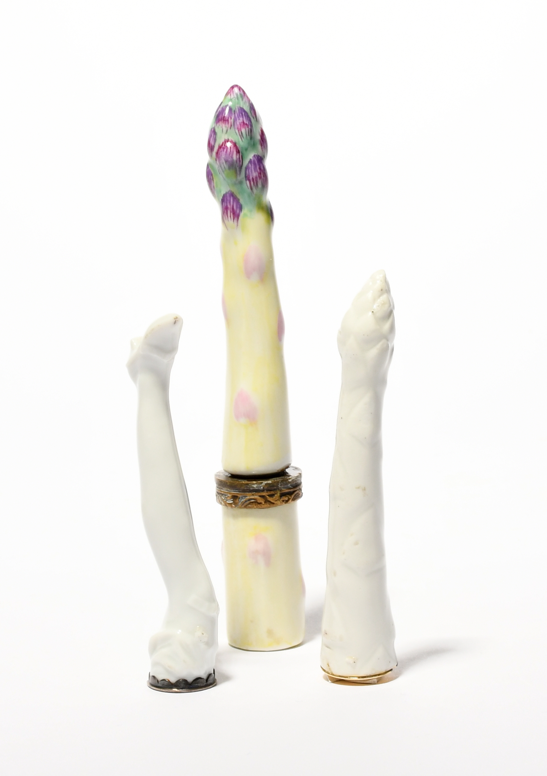 A German porcelain white-glazed pipe tamper, 18th century, modelled as the leg of a lady, a German - Image 2 of 2