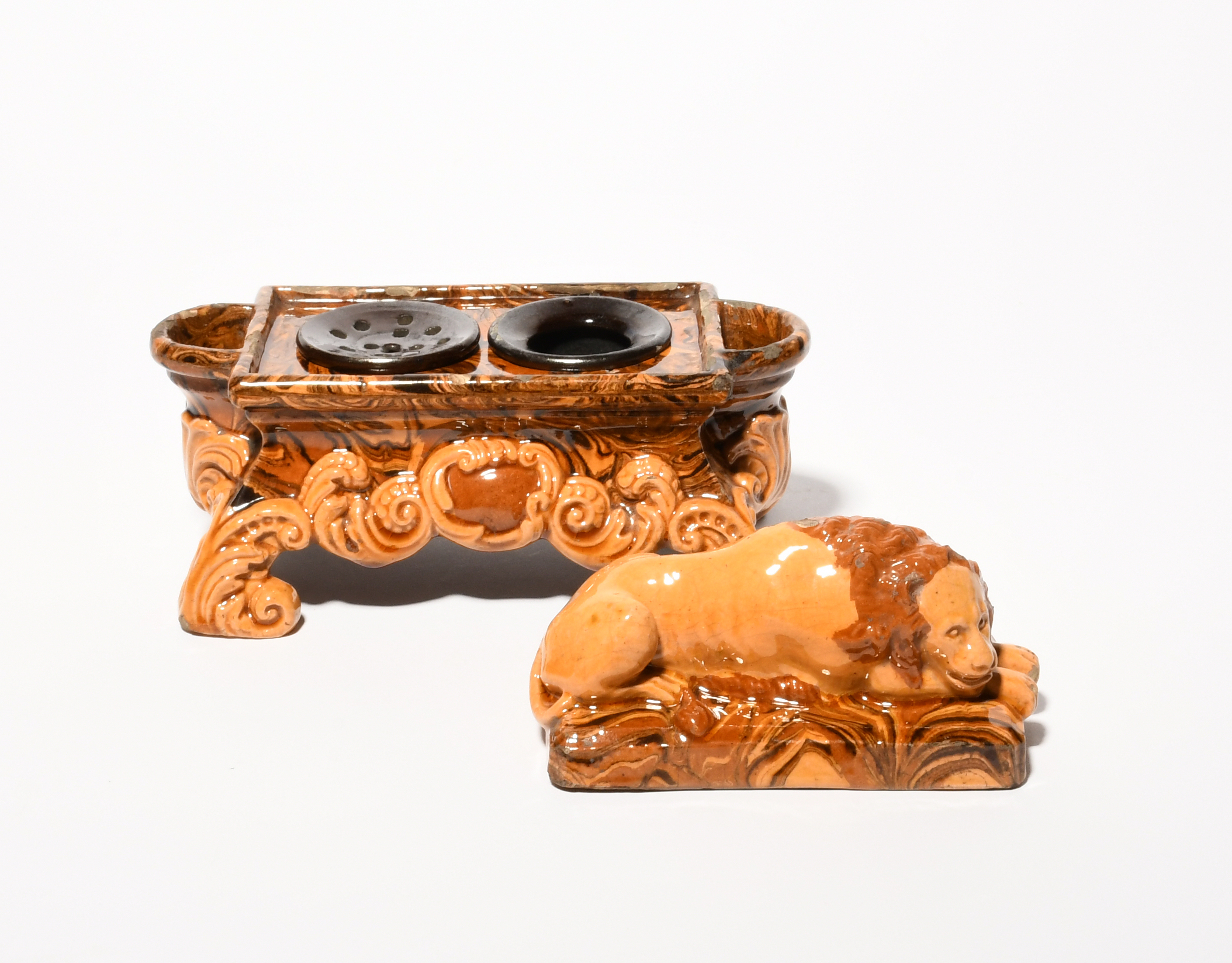 A slipware double inkwell, 19th century, the cover modelled with a recumbent lion, the rectangular - Image 3 of 4