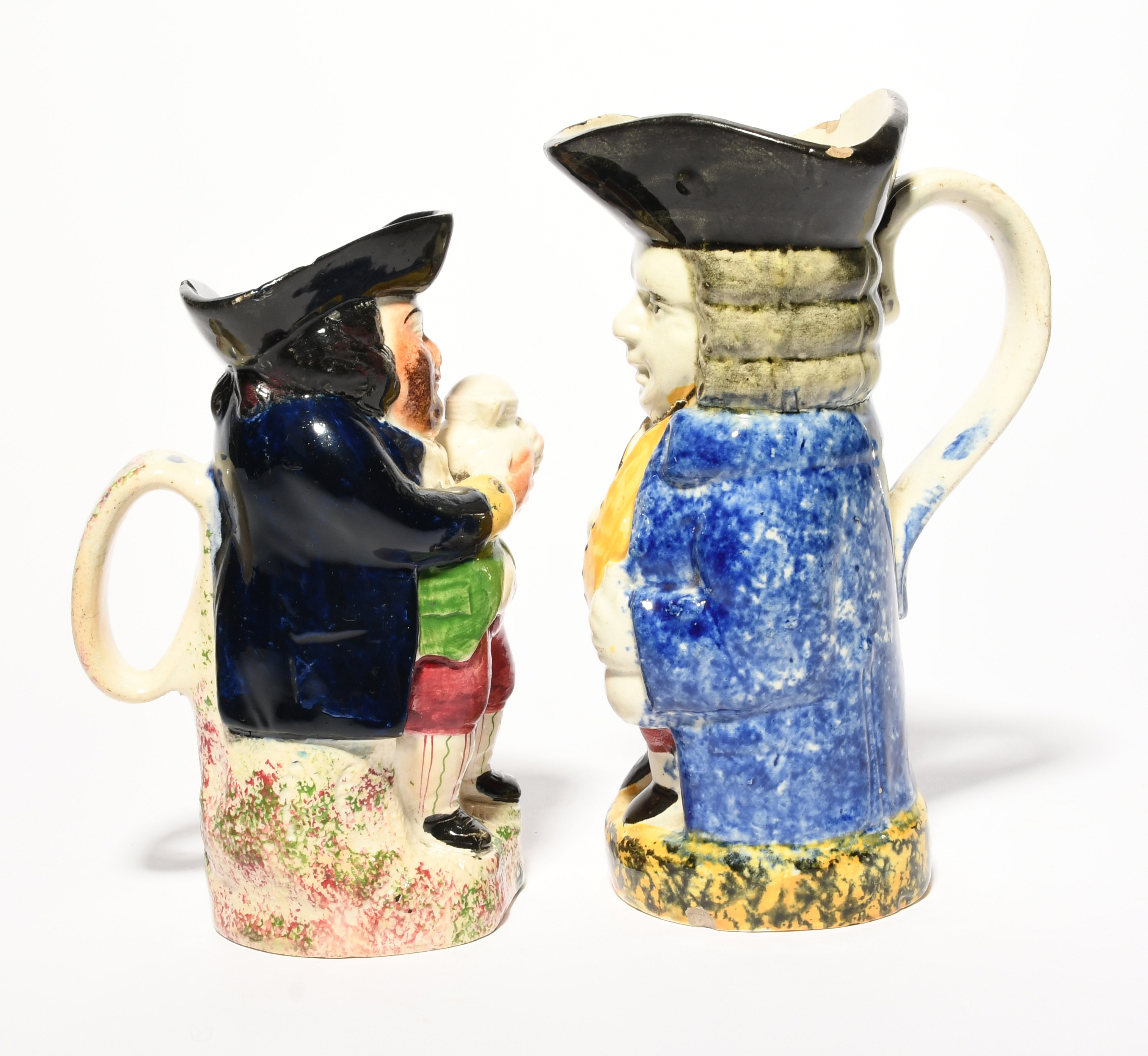 A Yorkshire standing toby jug, c.1810-20, holding a glass and bottle, wearing a sponged blue coat - Image 2 of 3