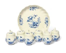 A set of six Tournai custard cups (pots à jus) and covers, c.1775, the rounded forms painted in blue