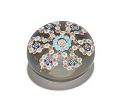 A large Baccarat garland or loop paperweight, c.1850, set with a central flowerhead group with a